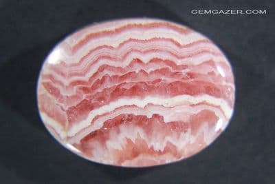 Rhodochrosite cabochon, Argentina. 19.80 carats.