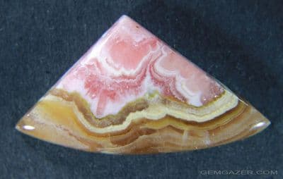 Rhodochrosite cabochon, Argentina.  22.63 carats.