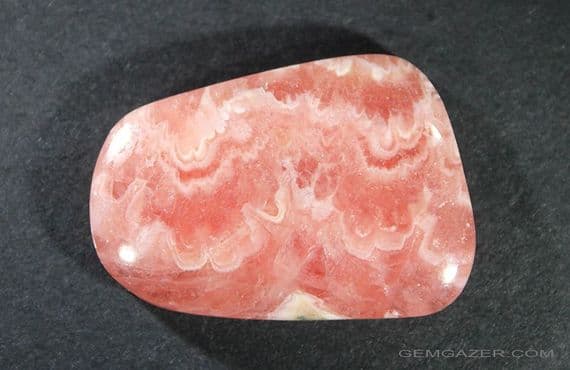 Rhodochrosite cabochon, Argentina.  42.85 carats.