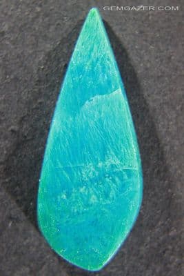 Sagenitic Chrysocolla cabochon, Ray mine, Arizona, USA.  17.76 carats.