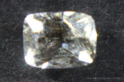 Scapolite, yellow fluorescent faceted, Afghanistan.  0.52 carat.