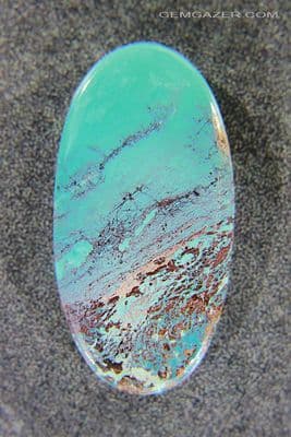 Scenic Shattuckite & Cuprite cabochon, Namibia. 36.71 carats.