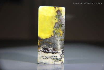 Scenic Yellow Turquoise & Hematite cabochon, Africa. 161.11 carats.