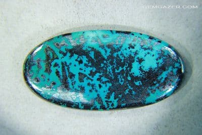 Shattuckite and Hematite cabochon, Namibia. 84.93 carats. (Video)