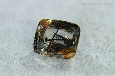Smoky Quartz with Tourmaline & Rutile, faceted, Pakistan. 3.16 carats. (Video)