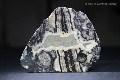 Spherulite nodule, part-polished, Scotland (Fluorescent). 104.88 grams.  ** SOLD **