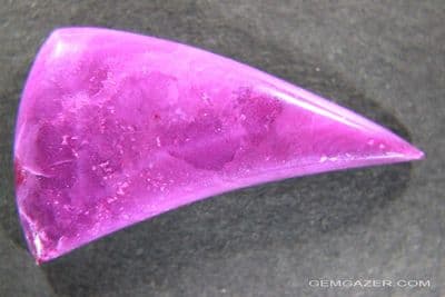 Sugilite cabochon, Wessels mine, South Africa.  23.30 carats.