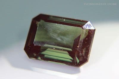 Synthetic Spinel, Verneuil method, dark Tourmaline green faceted. 24.33 carats.