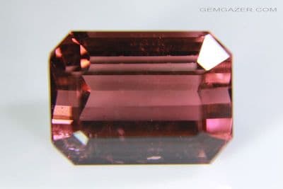 Tourmaline, pinkish-orange-red faceted, Brazil. 4.97 carats. (Video)