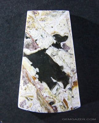 Trinidad Brecciated Jasper cabochon, California, USA.  71.10 carats.