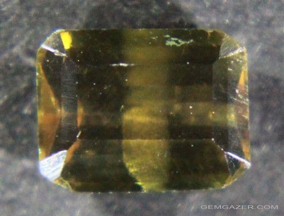 Triphylite, color-change green/red faceted, Brazil.  1.07 carats.