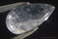 Vesuvianite (aka Idocrase) var: Cypirine, blue cabochon, Norway.  1.92 carats.