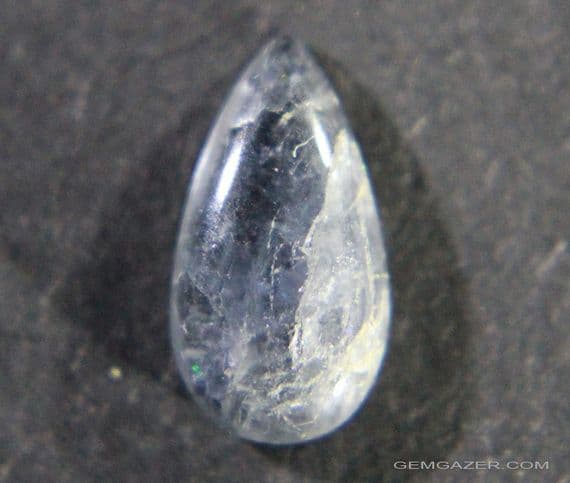 Vesuvianite (aka Idocrase) var: Cypirine, blue cabochon, Norway.  1.92 carats.