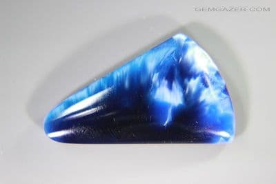 Victoria Stone / Imori Stone cabochon, royal blue, Japan. 13.69 carats. (Video)