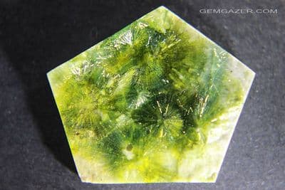 Wavellite cabochon (stabilized), Arkansas USA.  28.98 carats.