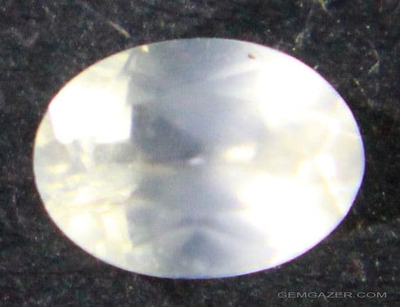 Willemite, pale orange faceted, Namibia.  0.41 carat.