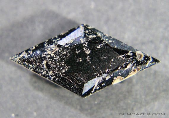 Wolframite / Ferberite, faceted, China.  11.82 carats.