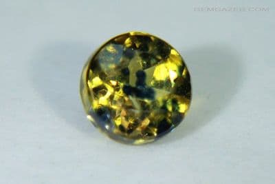 Yellow-Orange Sapphire, Be-diffusion treated, faceted, Tanzania. 0.73 carat.