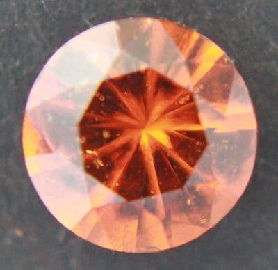Yellowish-orange Grossular Garnet, faceted, East Africa.  1.93 carats.
