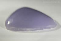 Yttrofluorite (aka Yttrium Fluorite) lavender cabochon, Mexico.  60.89 carats.