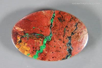 Zarinite cabochon, Russia. 32.69 carats.