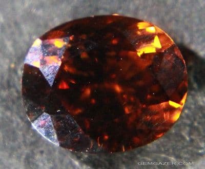 Zircon, orange brown faceted, Sri Lanka.  2.56 carats.