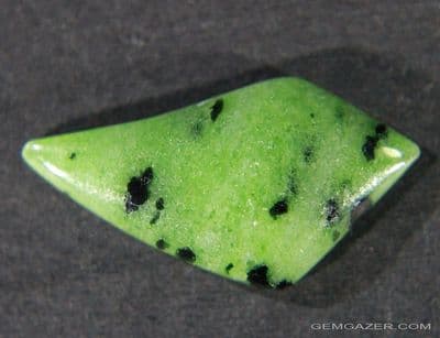 Zoisite cabochon, Tanzania.  13.75 carats.