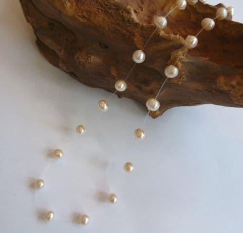 'Floating' Pearls in Lustrous White