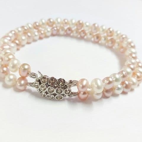 2-row white and peach-pink pearl bracelet