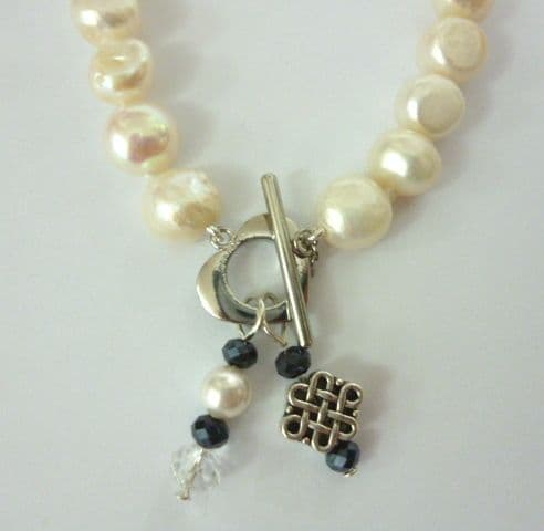 Baroque Pearl Bracelet with Celtic Style 'Infinity' Knot and Blue Crystal Pendant