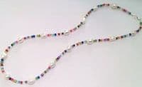 Baroque pearls on a multi-coloured crystal necklace.