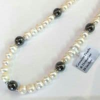 Freshwater pearls with hematite beads