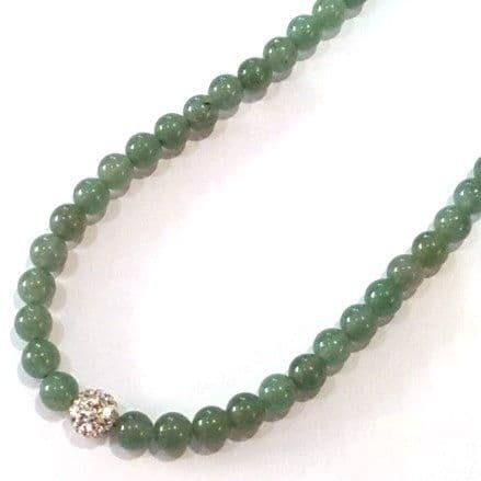 jade necklace with sparkling crystal