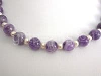 Pearl and amethyst necklace.