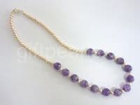 Pearl and amethyst necklace.
