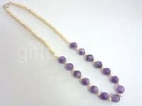Pearl and amethyst necklace.