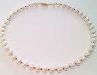 Pearl and Red Coral necklace with crystal clasp.