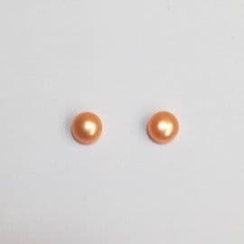 Salmon-orange pearl studs