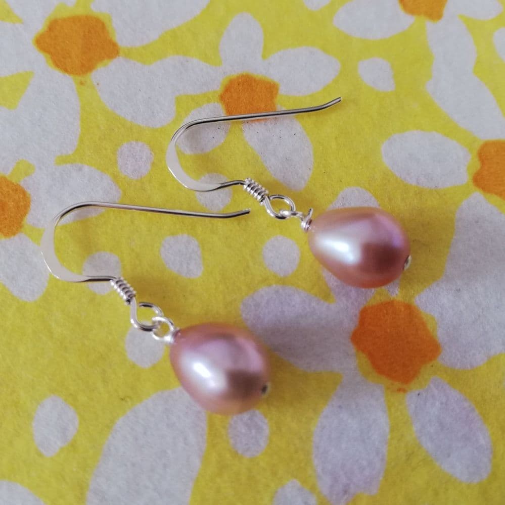 Tear drop lavender/pink pearls on silver hooks