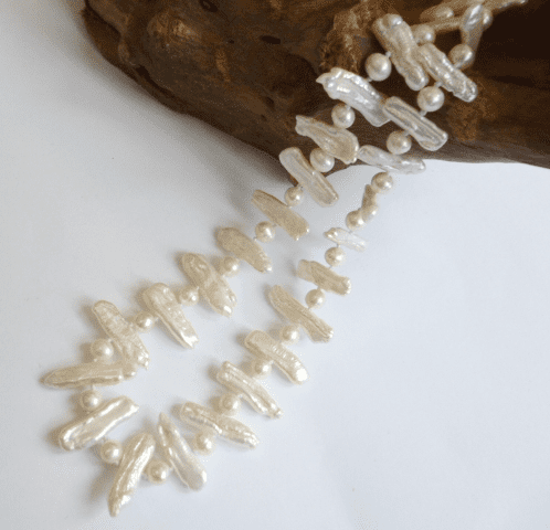 White 'Biwa' pearl with small pearls