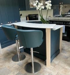 2 Doris P Bar Stools at a small breakfast bar. 