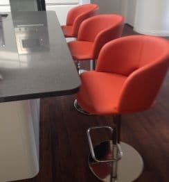 3 Fashion Bar Stools in Terracotta Leather at a Breakfast Bar