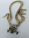 SNAKE WITH SKULL AND CROSSBONES EAR CUFF 5319