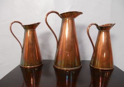 SOLD - Three Solid Copper Water Jugs