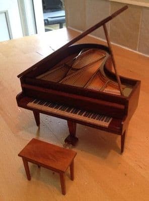 244. Grand Piano and Stool