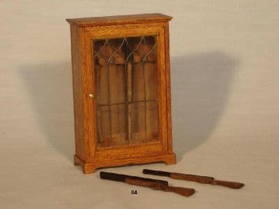 84. Small Gun Cabinet with Guns