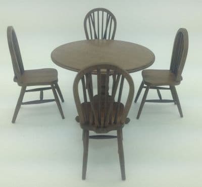 Curved windsor chairs and round table