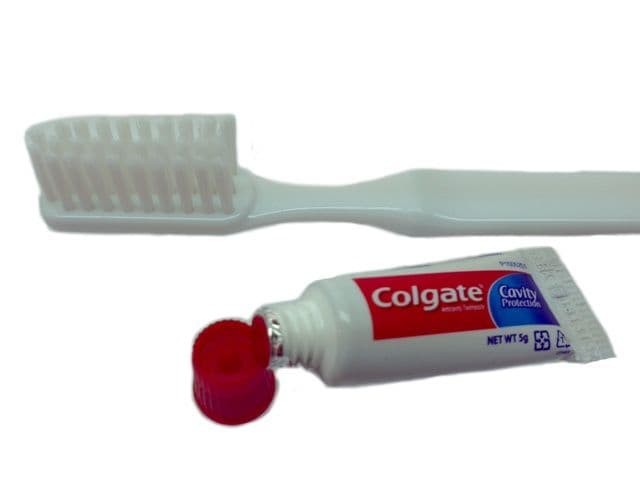 Dental Kit with Colgate Toothpaste in Cellophane Wrapper