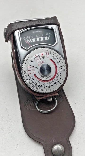 Minette light meter with case and folding incident cover
