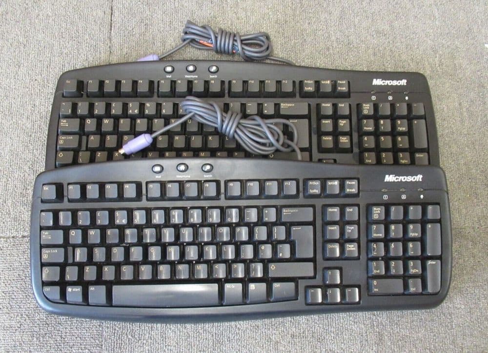2 x Microsoft X800469-276 PS/2 Wired Black UK QWERTY 107-keys Basic Keyboard
